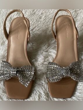The Drop cream shimmer bow statement kitten heels sling back formal Sandals